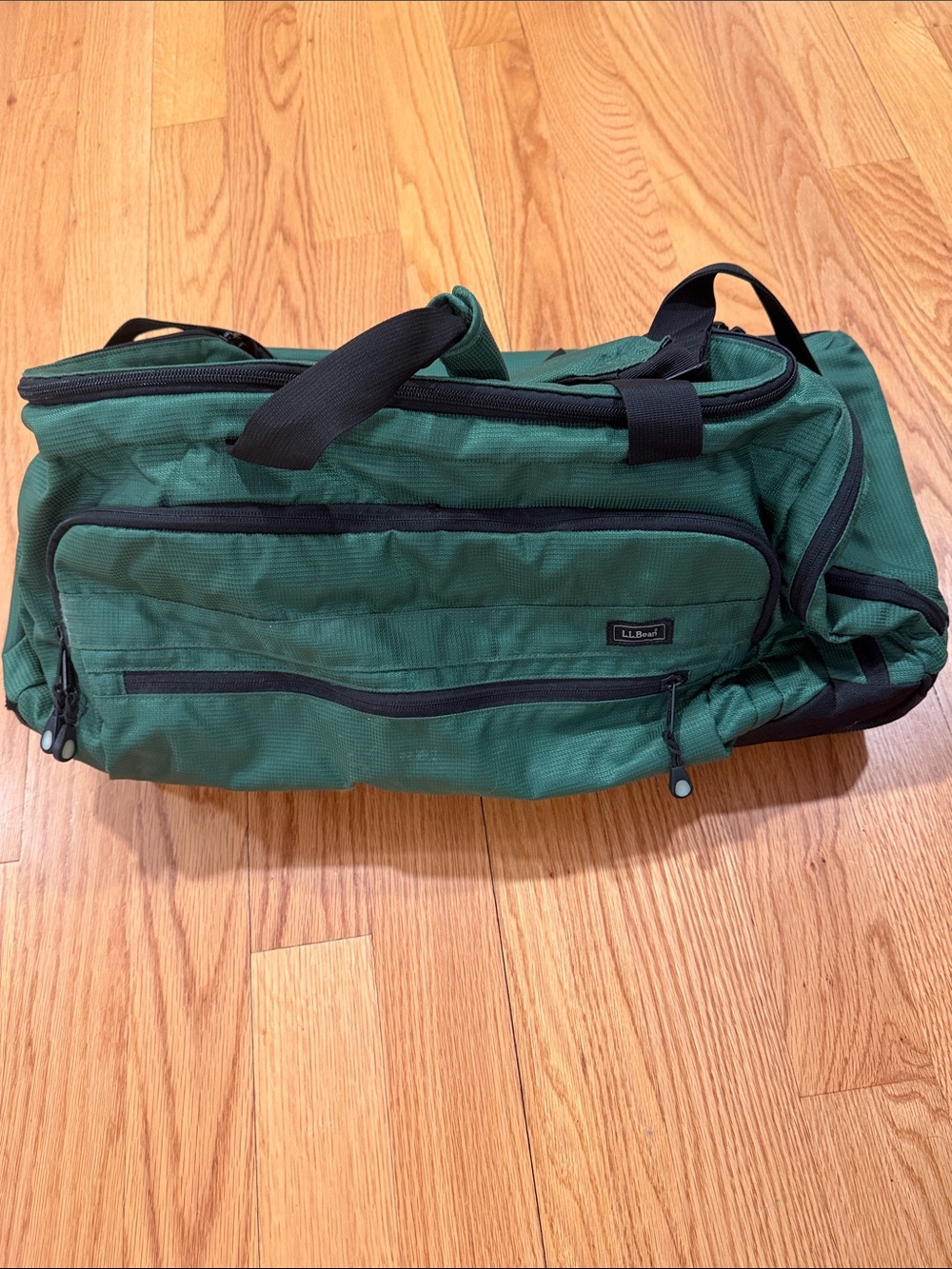L.L. Bean dark Green rolling Duffel Bag
